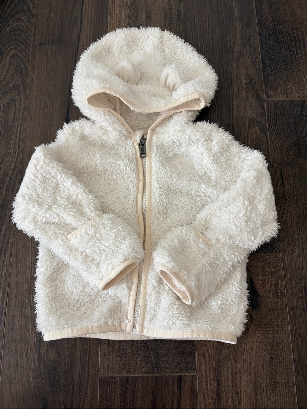 The North Face white 
Hooded Jacket